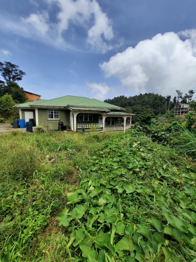 3 bedrooms, 2 baths house plus 2 bedrooms apt in Sylvania, Dominica – $450,000 / US$168,539 – greatly reduced.