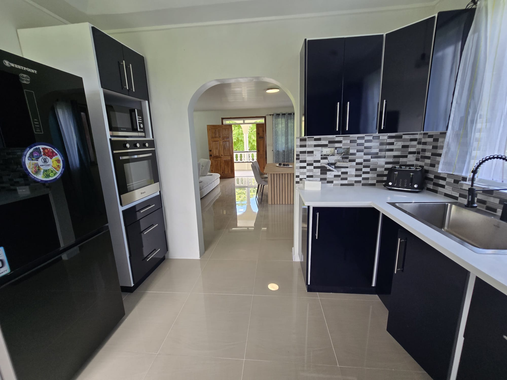 3 bedrooms, 2 baths top floor for rent in Morne Daniel, Dominica – EC$5000 / US$1875 monthly