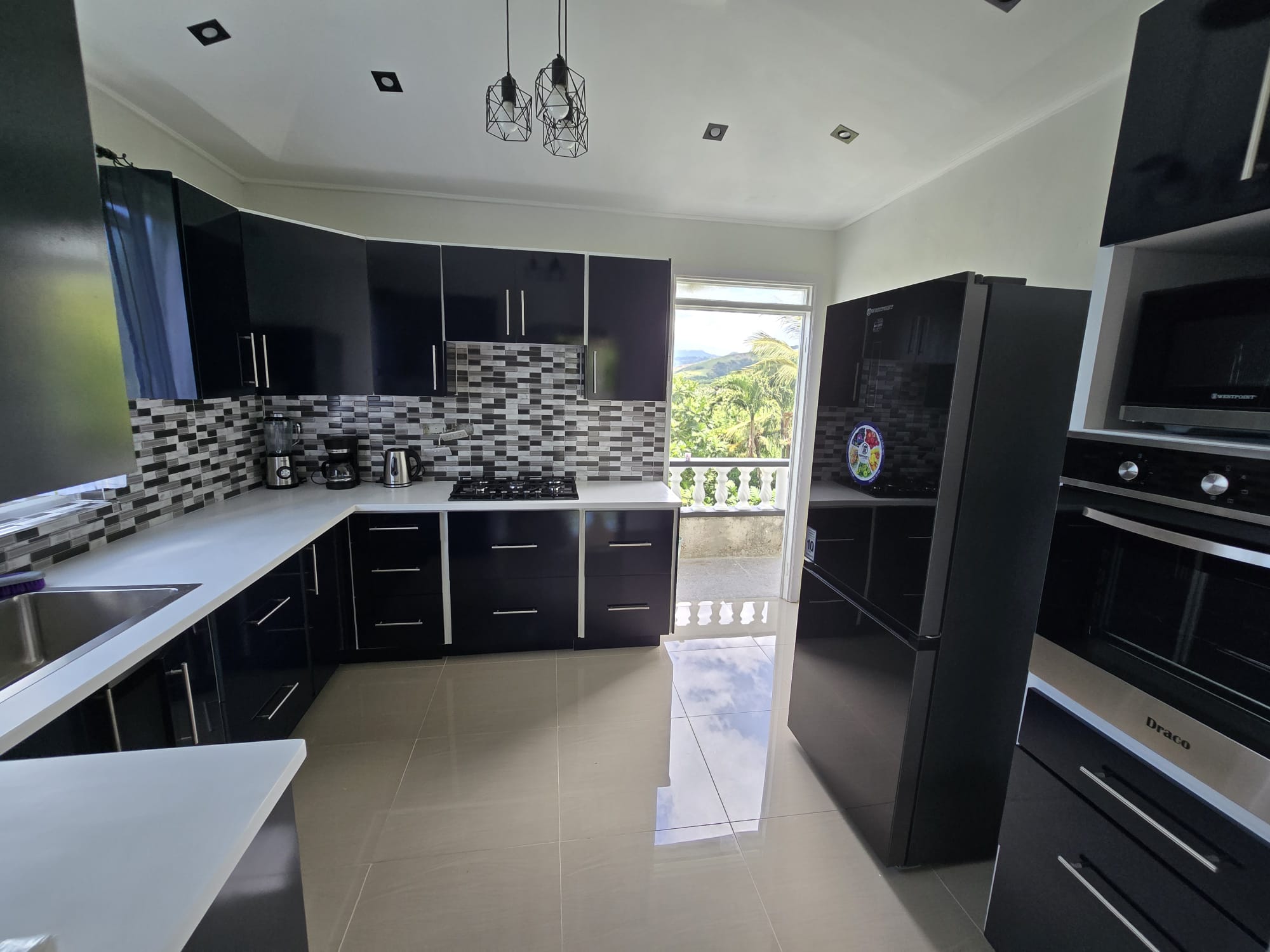 3 bedrooms, 2 baths top floor for rent in Morne Daniel, Dominica – EC$5000 / US$1875 monthly